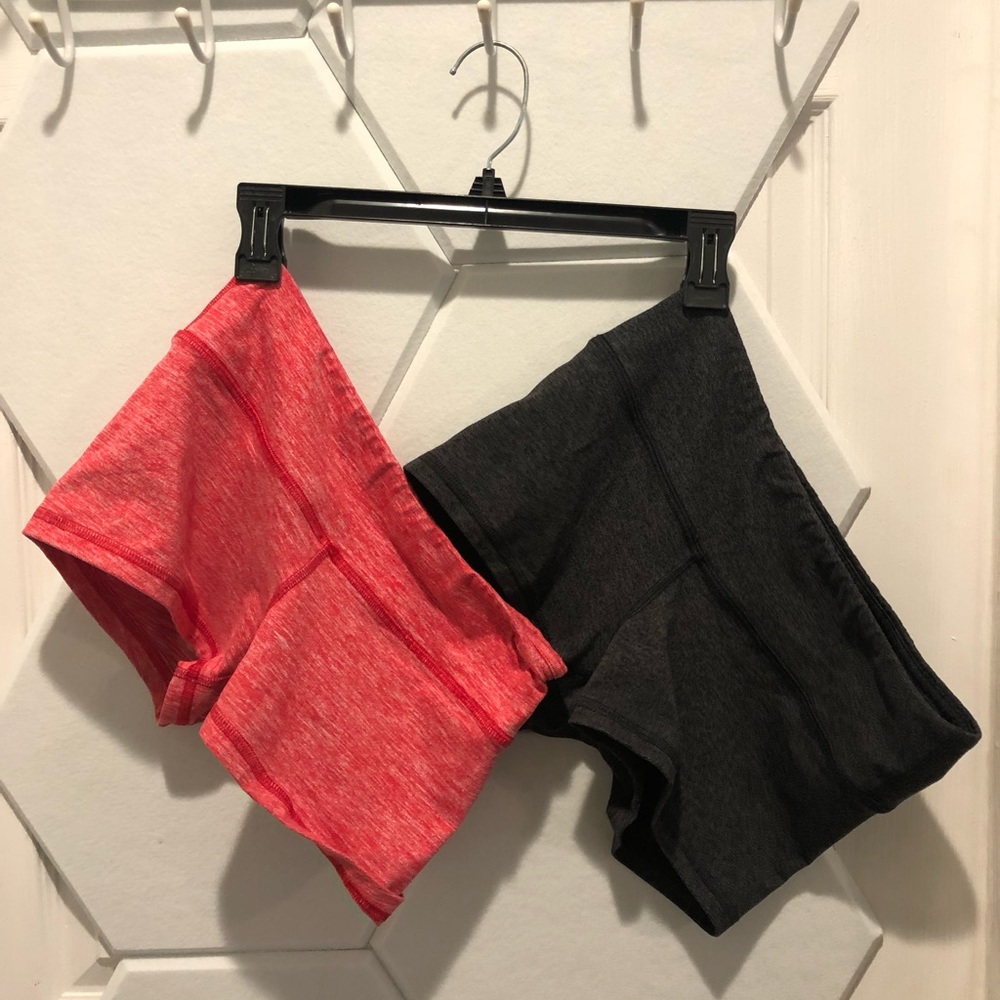 2 pairs of FLEO workout shorts. Red and dark gray. Size Small
